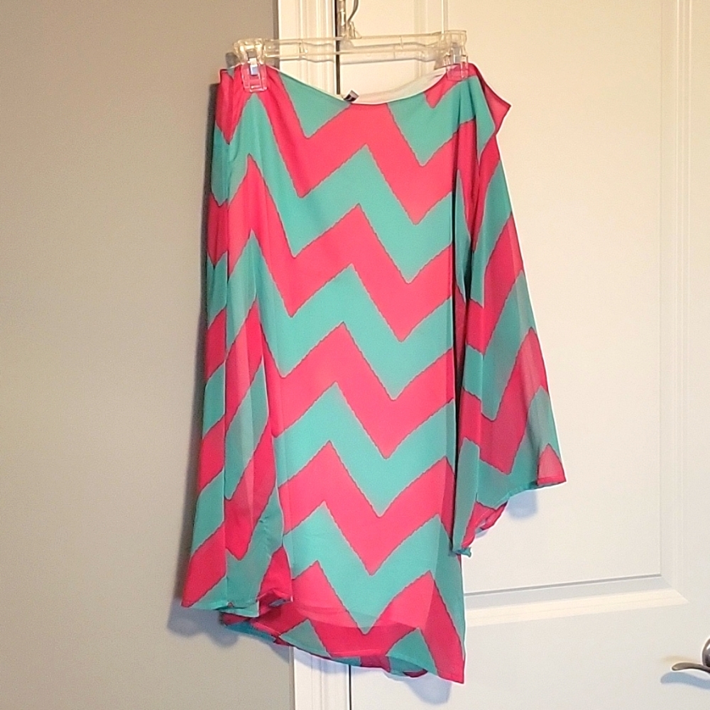Mini one sleeve vintage 70's dress. Size small
